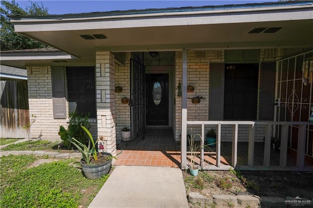 property entrance with a porch