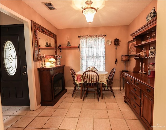 view of tiled dining space