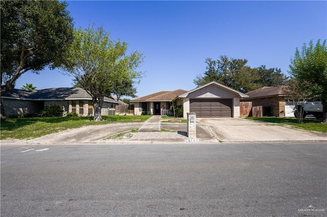 ranch-style house featuring a garage