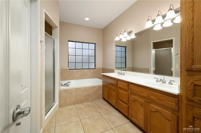 2729 Biltmore Ave, Edinburg, TX 78539 - full bath featuring a stall shower, tile patterned flooring, a bath, and double vanity