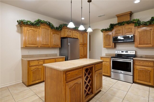 2729 Biltmore Ave, Edinburg, TX 78539 - kitchen with appliances with stainless steel finishes, light tile patterned flooring, decorative light fixtures, recessed lighting, and light countertops