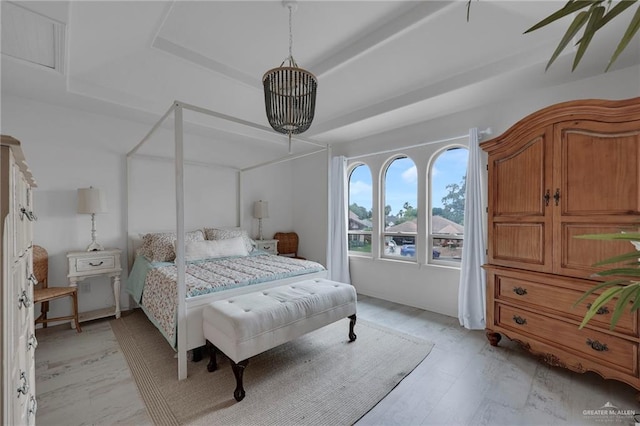 1909 Lake Point Dr, Mission, TX 78572 - bedroom featuring light wood-style floors and a tray ceiling