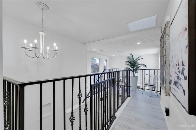 1909 Lake Point Dr, Mission, TX 78572 - hallway featuring an inviting chandelier, wood finished floors, visible vents, and recessed lighting