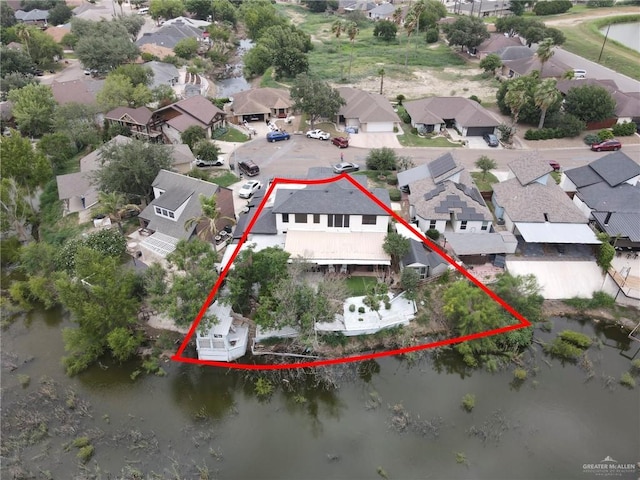 1909 Lake Point Dr, Mission, TX 78572 - drone / aerial view with a residential view and a water view
