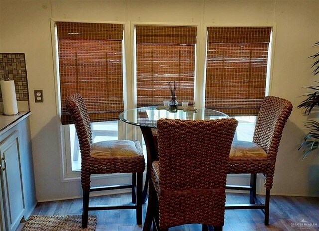 dining area featuring hardwood / wood-style floors