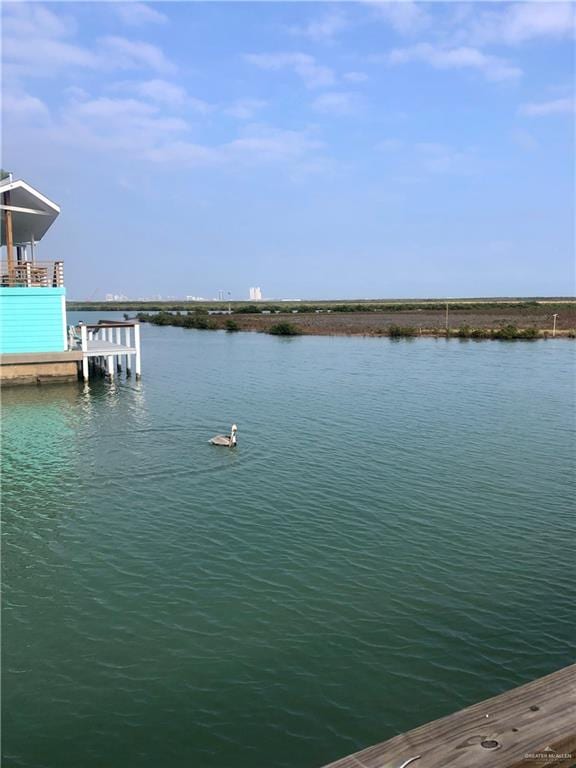 view of dock with a water view