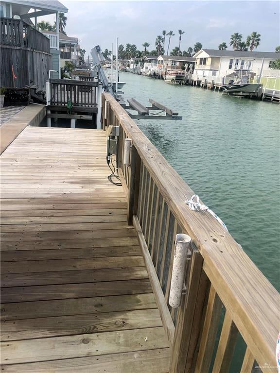 dock area with a water view