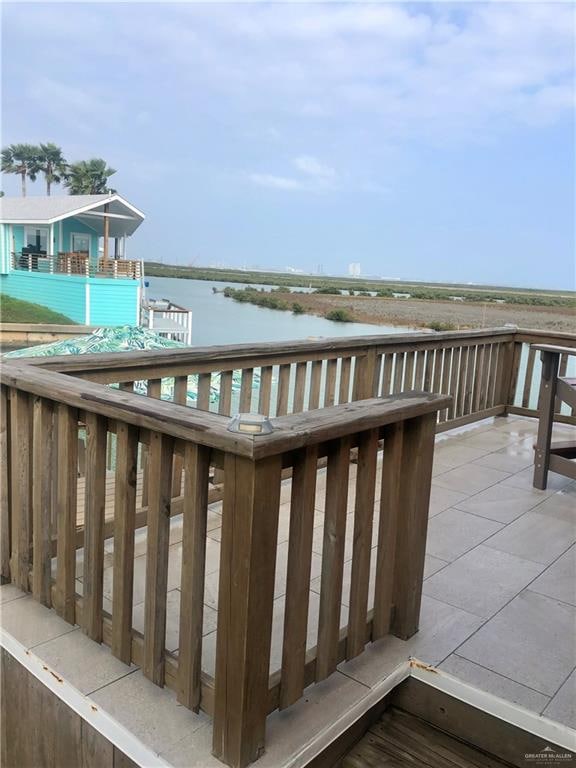 deck featuring a water view