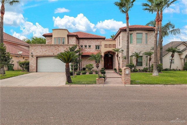 mediterranean / spanish-style house with a front lawn