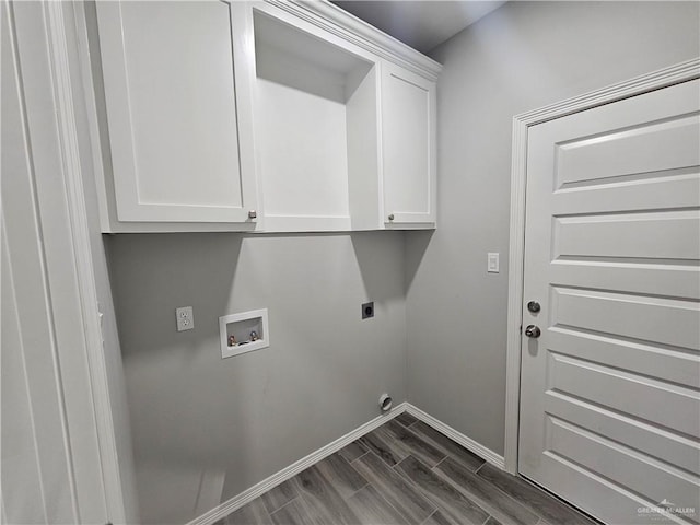 clothes washing area with hookup for an electric dryer, dark hardwood / wood-style floors, cabinets, and hookup for a washing machine