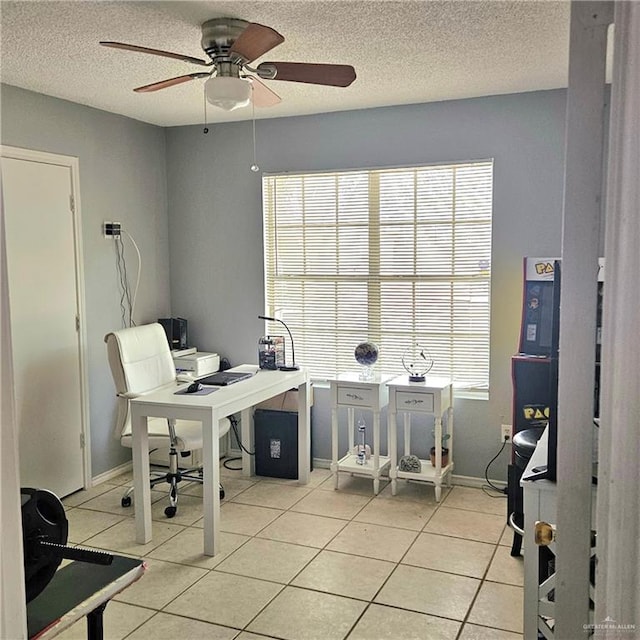 1414 Vatia Blvd, Mission, TX 78572 - office area with light tile patterned floors, a ceiling fan, and a textured ceiling