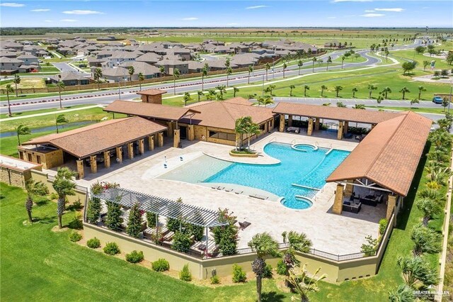 birds eye view of property with a residential view