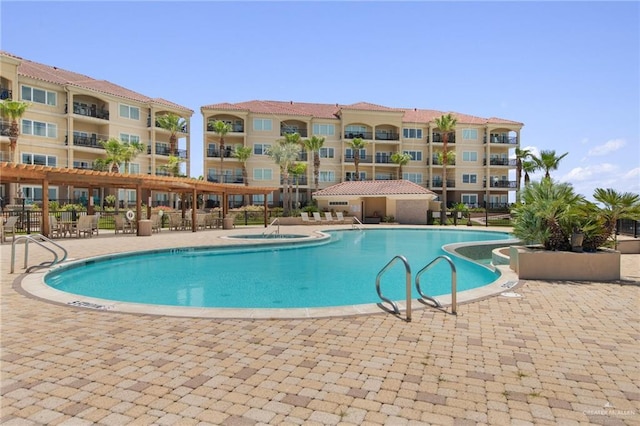 301 Houston Ave, Port Isabel, TX 78578 - community pool featuring a patio