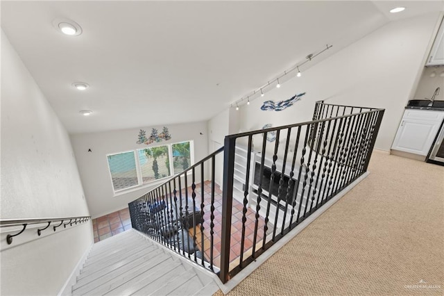 301 Houston Ave, Port Isabel, TX 78578 - staircase with recessed lighting and baseboards