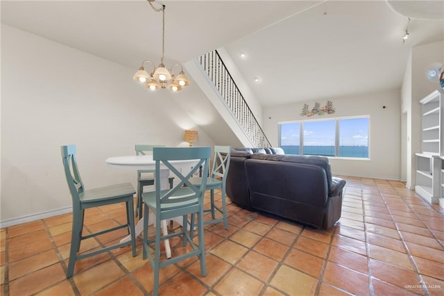 301 Houston Ave, Port Isabel, TX 78578 - dining space with a chandelier and stairs