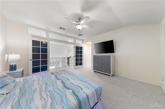 301 Houston Ave, Port Isabel, TX 78578 - bedroom with carpet floors, vaulted ceiling, and ceiling fan