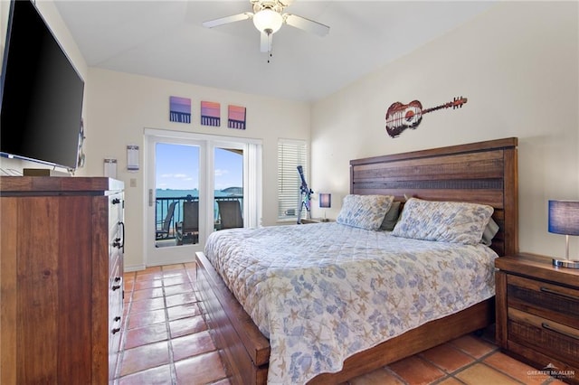 301 Houston Ave, Port Isabel, TX 78578 - bedroom with access to outside, light tile patterned floors, and a ceiling fan