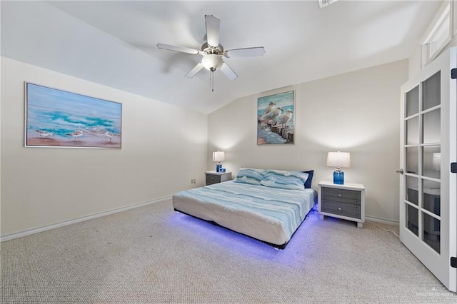 301 Houston Ave, Port Isabel, TX 78578 - bedroom with light colored carpet, lofted ceiling, and ceiling fan
