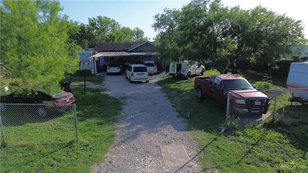 313 Eva St, Elsa, TX 78543 - view of front of house featuring driveway