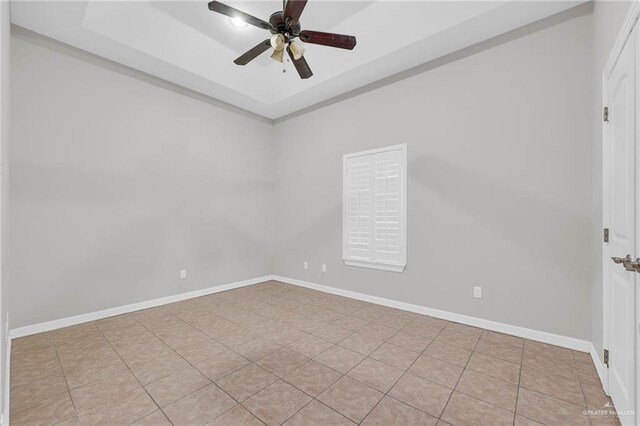 3517 N 43rd St, Mcallen, TX 78501 - empty room featuring a ceiling fan, a raised ceiling, and baseboards