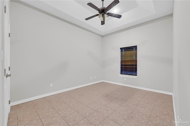 3517 N 43rd St, Mcallen, TX 78501 - empty room featuring a tray ceiling, ceiling fan, and baseboards