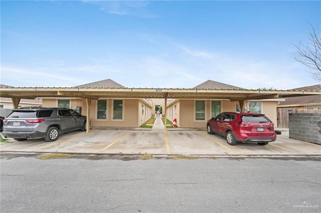 single story home with a carport