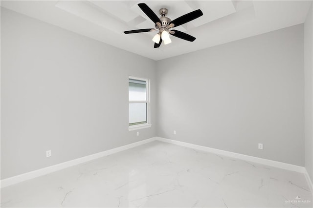 spare room with ceiling fan