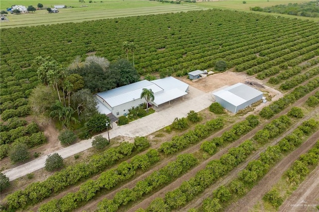 birds eye view of property featuring a rural view