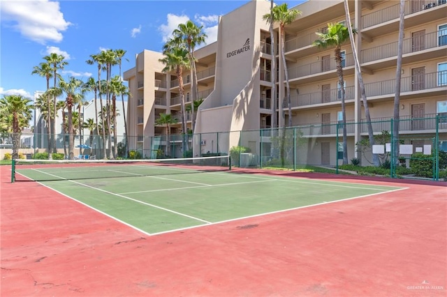 view of tennis court featuring basketball court