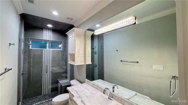 full bath featuring toilet, visible vents, vanity, a shower stall, and crown molding