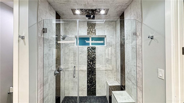 full bathroom featuring a shower stall