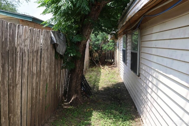 1100 Dormiendo St, Edinburg, TX 78539 - view of side of property featuring fence