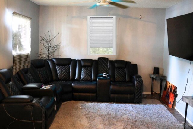 1100 Dormiendo St, Edinburg, TX 78539 - living room featuring ceiling fan and baseboards