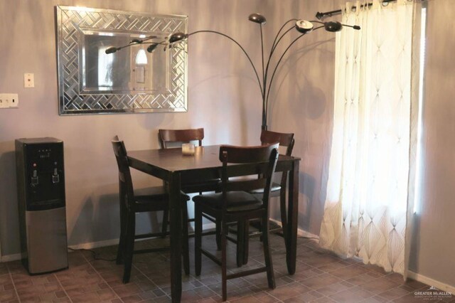 1100 Dormiendo St, Edinburg, TX 78539 - dining area featuring baseboards