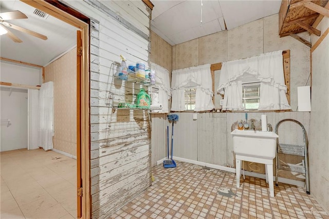 bathroom with ceiling fan, wallpapered walls, tile patterned floors, and visible vents