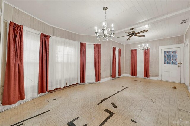 empty room with tile patterned floors, visible vents, and an inviting chandelier