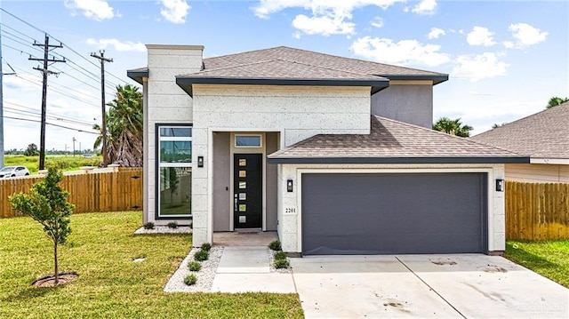 2201 Antelope Canyon St, Edinburg, TX 78541 - modern home featuring an attached garage, a shingled roof, and driveway