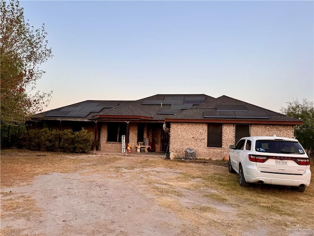 prairie-style house with solar panels