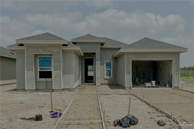 1334 S 9th St, Alamo, TX 78516 - prairie-style home with a garage and roof with shingles