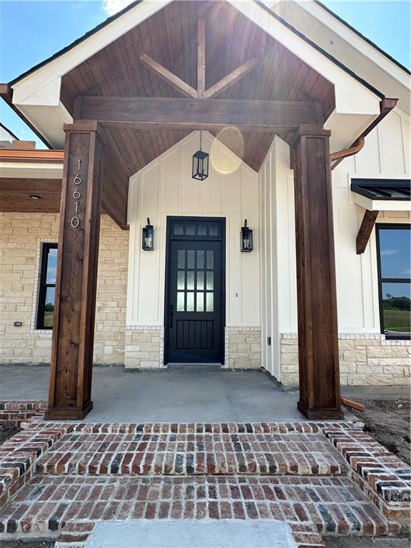 entrance to property with covered porch