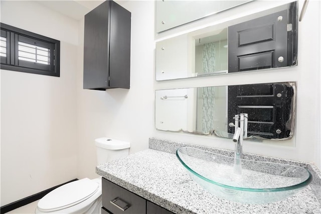 1916 N 46th St, Mcallen, TX 78501 - half bathroom featuring toilet and vanity
