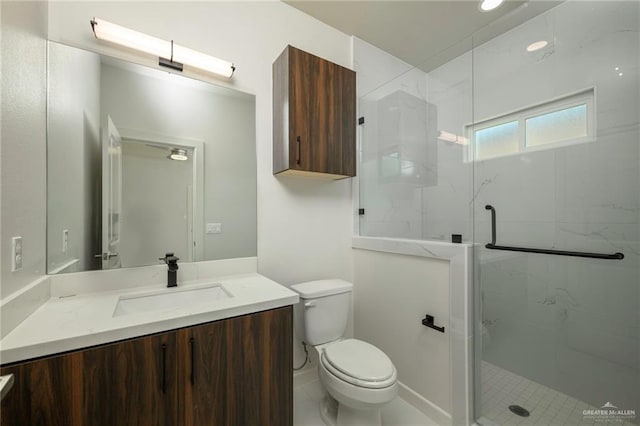 613 Cove Ln Unit 2, Weslaco, TX 78596 - full bathroom featuring toilet, a marble finish shower, and vanity
