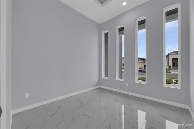 3107 S Auburndale Ave, Edinburg, TX 78542 - spare room with baseboards, marble finish flooring, and recessed lighting