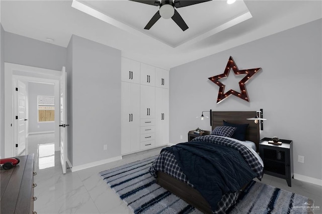 3107 S Auburndale Ave, Edinburg, TX 78542 - bedroom featuring light marble finish flooring, ceiling fan, and baseboards