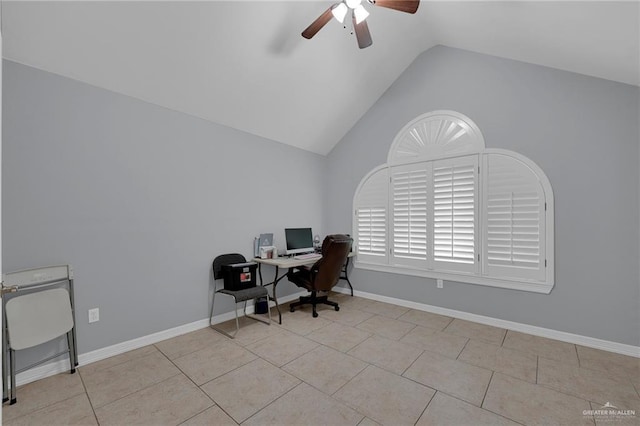 tiled home office with lofted ceiling, a ceiling fan, and baseboards
