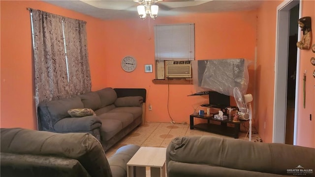 living room with ceiling fan and cooling unit