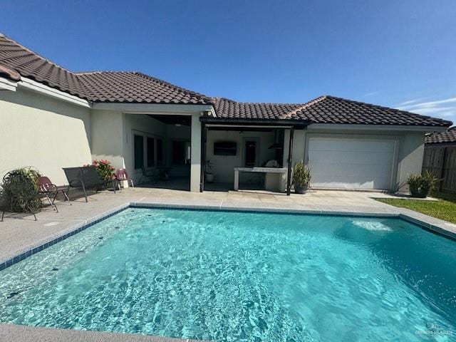 view of pool featuring a patio