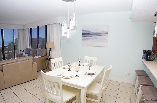 dining room with light tile patterned flooring