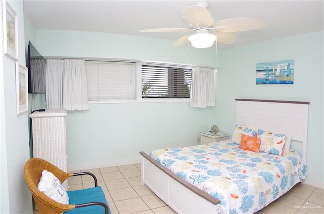 bedroom with light tile patterned flooring and ceiling fan