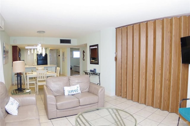 living room with light tile patterned flooring